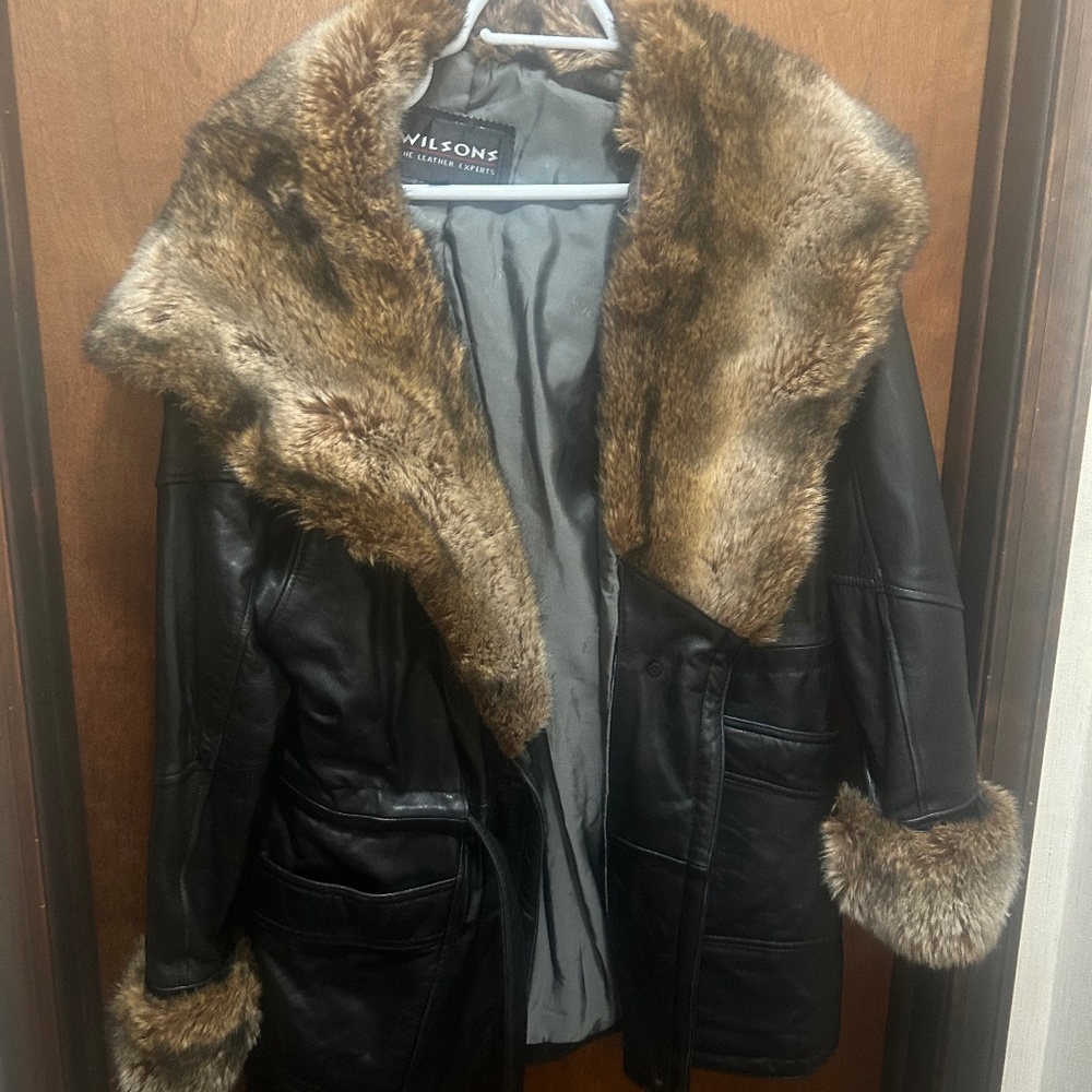 Leather coat with fur collar